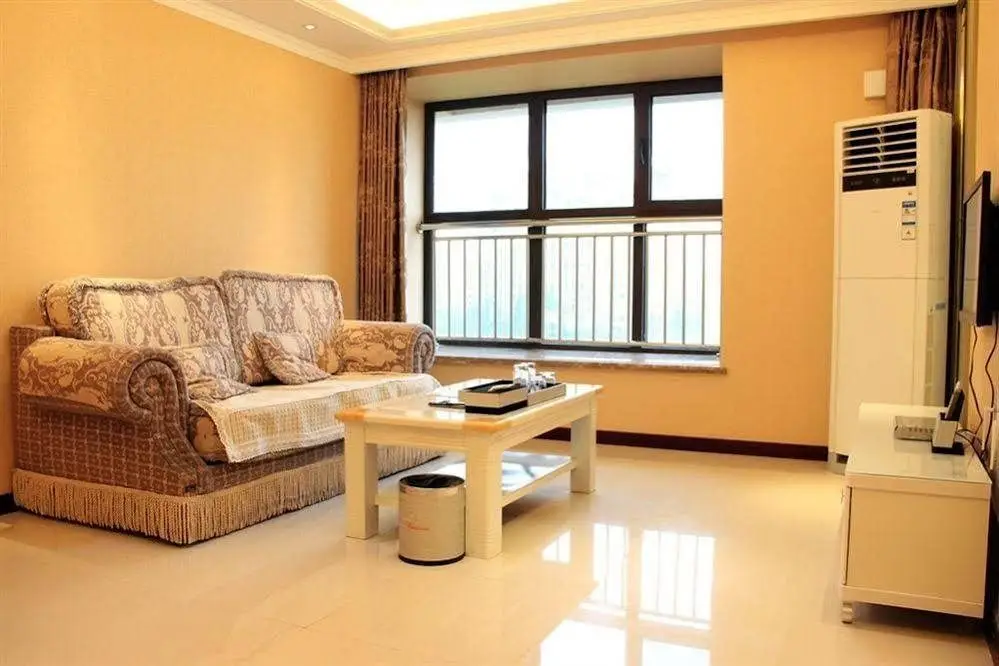 Циндао: Qingdao Bushe Golden Beach Apartment