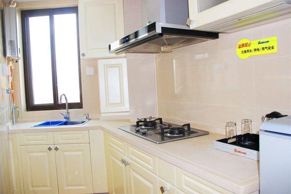Циндао: Qingdao Bushe Golden Beach Apartment