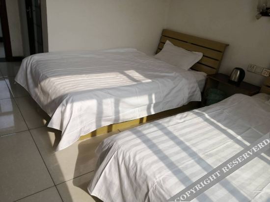 Хецзе: Shanxian Anjie Business Hotel