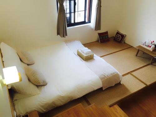 Шанхай: Nongshe Hostel