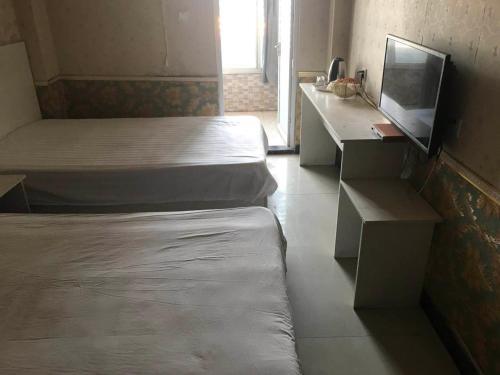 Линьи: Hao Shuo Business Hotel