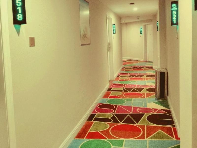 Хайкоу: Green Tree Inn Haikou Airpot Shuttle Bus Xiakan Station Shell Hotel