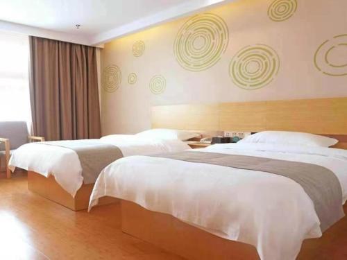 Интань: GreenTree Inn YingTan Xinjiang New District Municipal Government Yizhong Hotel