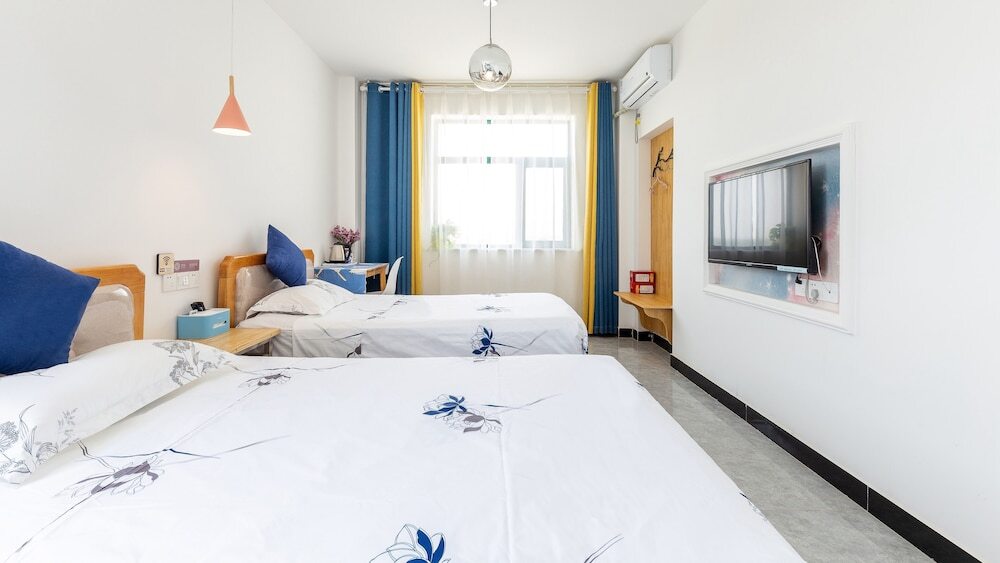 Цзюцюань: Floral Hotel Jiu Qi Yin Ju Dunhuang