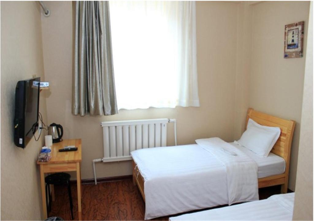 Далянь: Dalian Pocket Express Hotel
