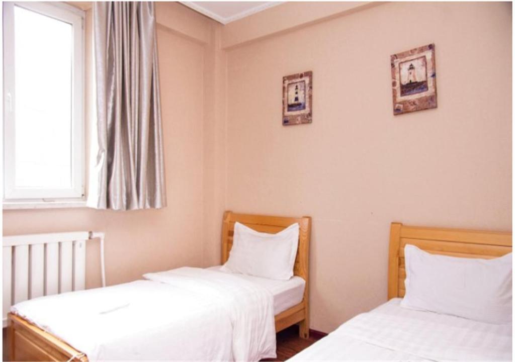 Далянь: Dalian Pocket Express Hotel