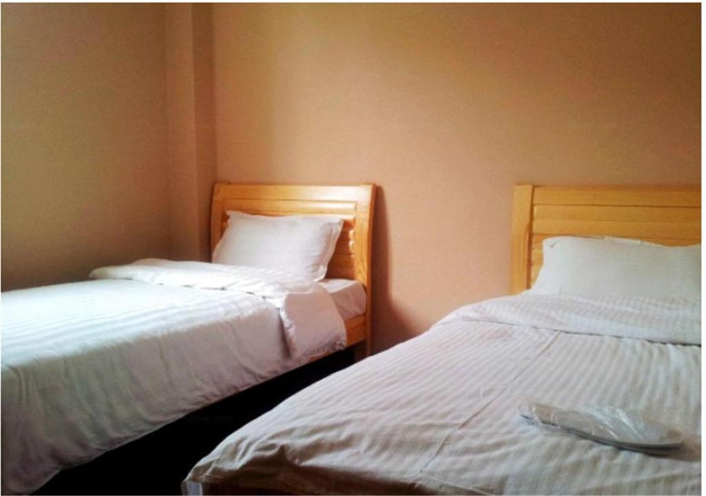 Далянь: Dalian Pocket Express Hotel