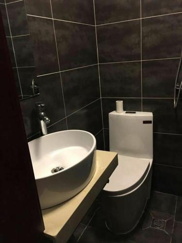 Далянь: Shangpin Gongchang Boutique Apartment