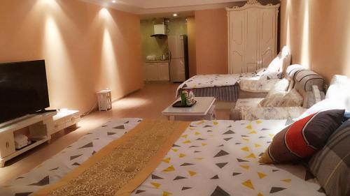 Цицикар: Qiqihar Wanda Golden Coast Apartment