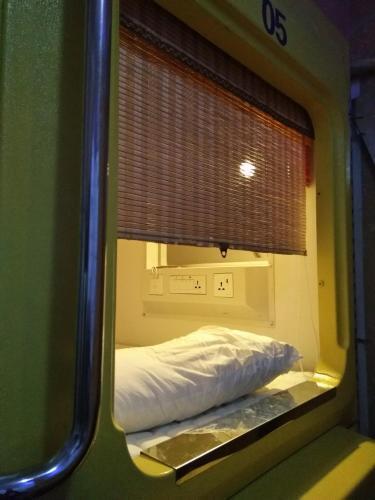 Хучжоу: Shiguang yizhan Capsule Youth Hostel