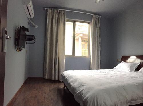 Шаоксинг: Longmen Guesthouse