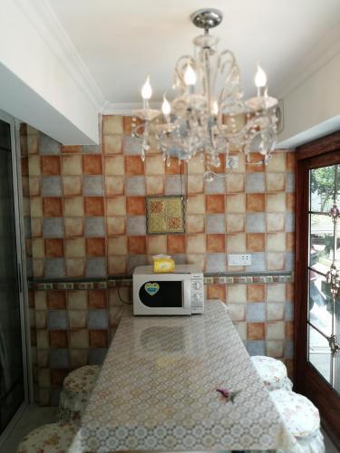 Чжанцзяган: Zhangjiagang City Center Guotai Mansion Homestay with Sunshine