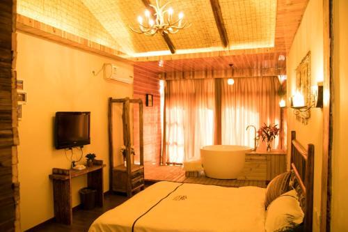 Лицзян: Lijiang Lugu Lake Chujian Homestay