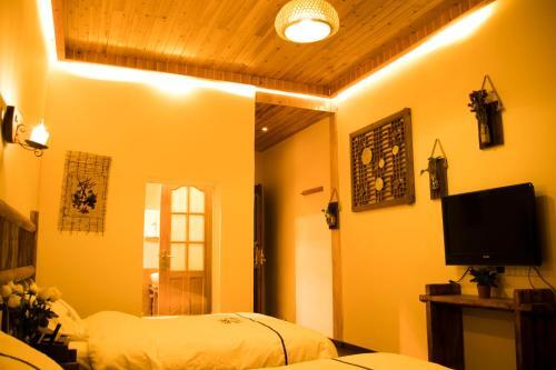 Лицзян: Lijiang Lugu Lake Chujian Homestay