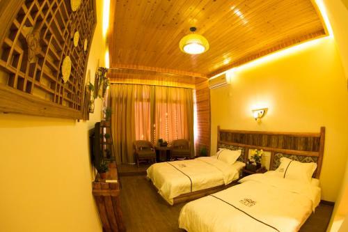 Лицзян: Lijiang Lugu Lake Chujian Homestay