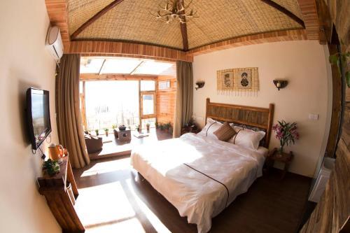 Лицзян: Lijiang Lugu Lake Chujian Homestay