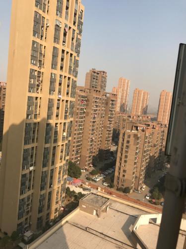 Ухань: Sweet Home Apartment