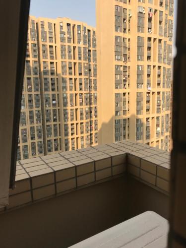 Ухань: Sweet Home Apartment