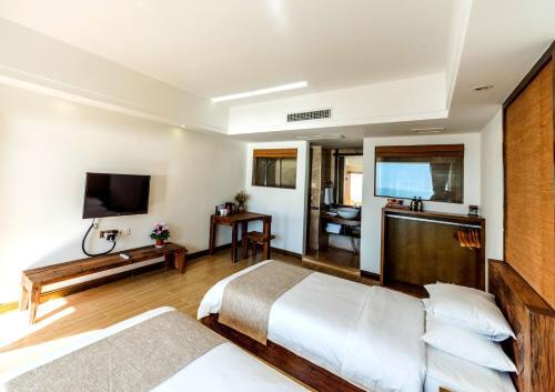Дали: Dali Jinsuo Island Boyue Hostel