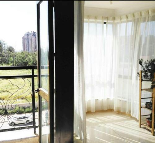 Пекин: Beijing Yijing Family Apartment