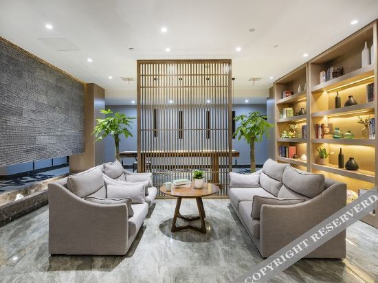 Хучжоу: New Century Manju Hotel (Zhili Huide Internationali)