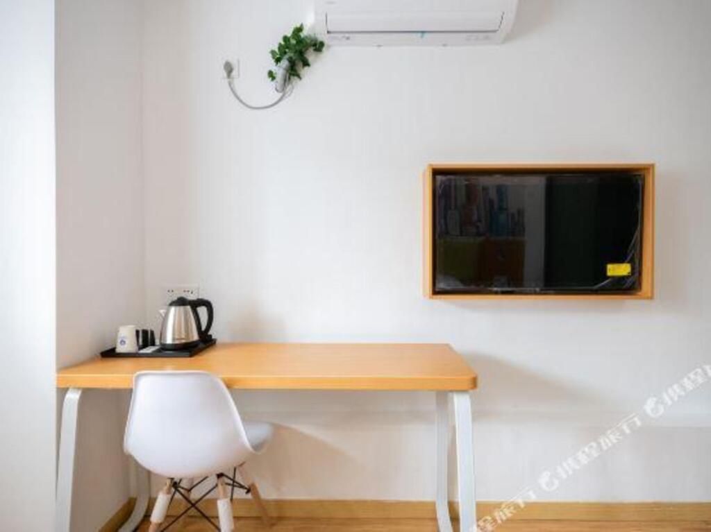 Шанхай: Shanghai Hongqiao International Exhibition Center  99 Xinbiao Selected Hotel