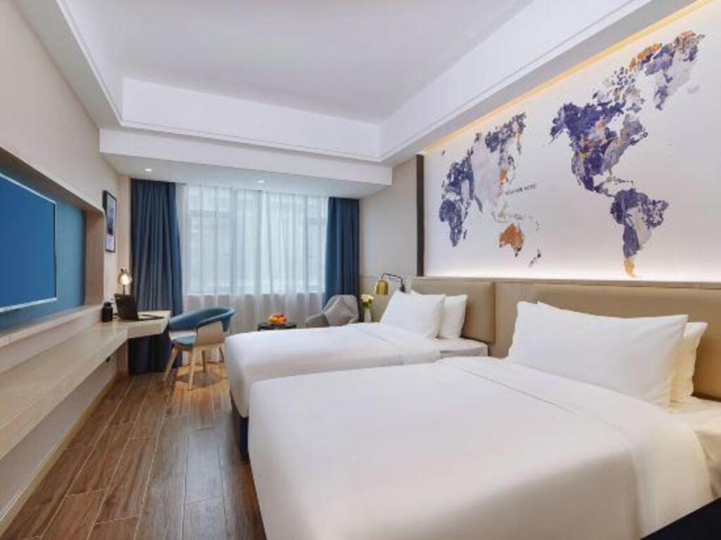 Дунгуань: Kyriad Marvelous Hotel (Dongguan Huayang Lake University City Store)