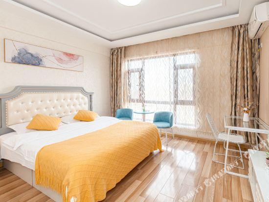 Далянь: Mango Business Holiday Apartment (Dalian South China Plaza)