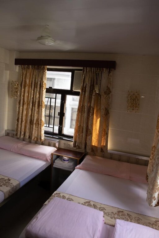 Гонконг: New Las Vegas Guest House 5F