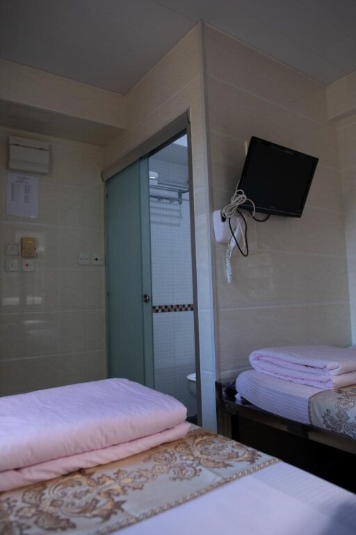 Гонконг: New Las Vegas Guest House 5F