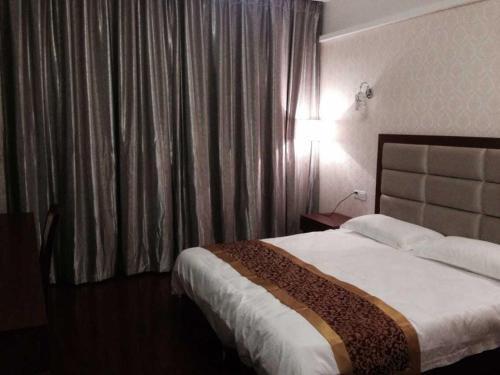 Ичунь: JUNYI Hotel Jiangxi Yichun Fengcheng People's Hosipital Xinglin Community