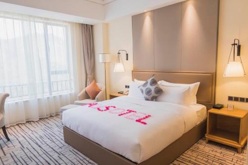 Гуанчжоу: Nanhong Ausotel Guangzhou