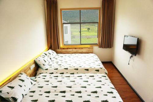 Синъи: Xingyi Wanfeng Lin Jianshan Guest House