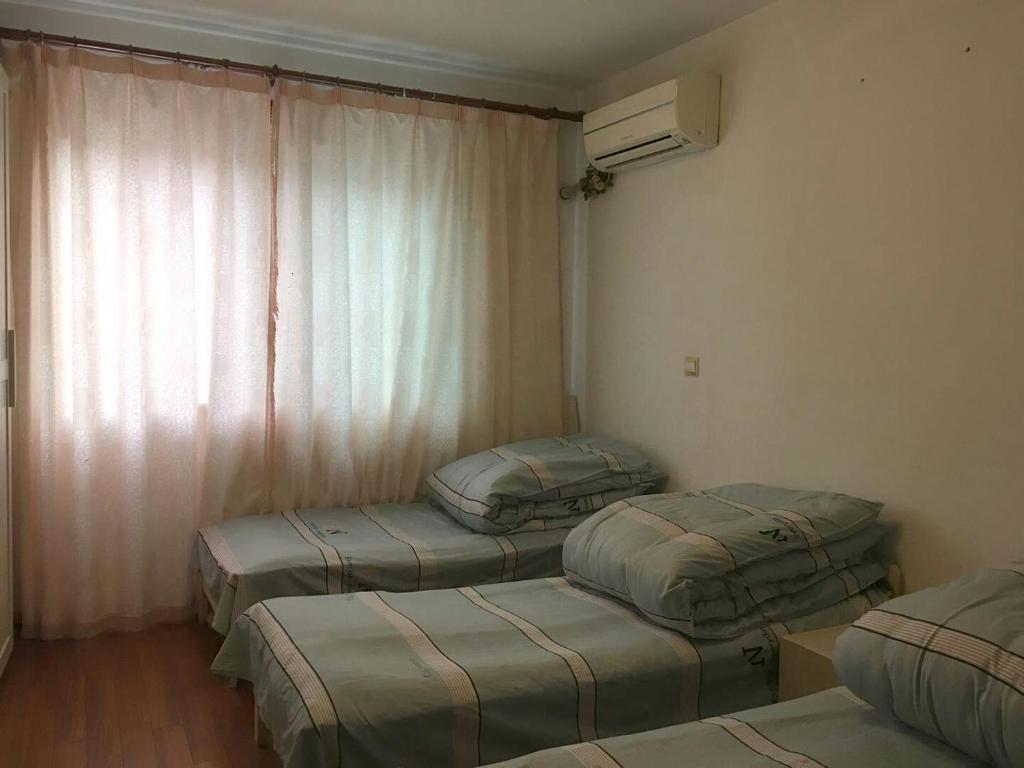 Шанхай: Pusuweilan Hostel