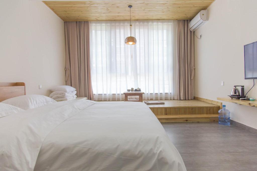 Чэнду: Bloom Time Guest House