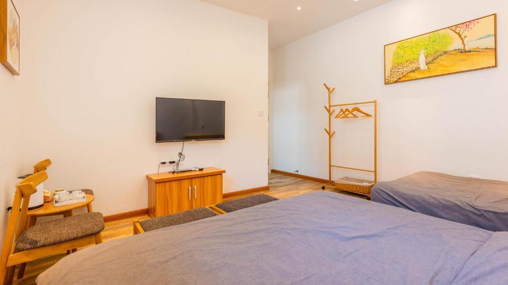 Циндао: Floral Hotel Qingdao Youshan Courtyard Resort