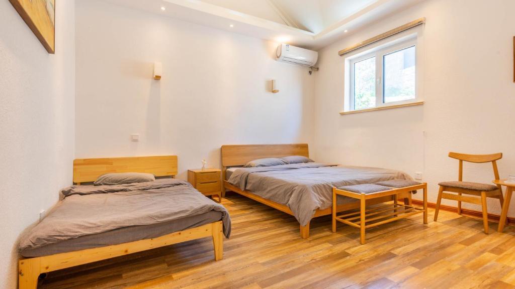 Циндао: Floral Hotel Qingdao Youshan Courtyard Resort