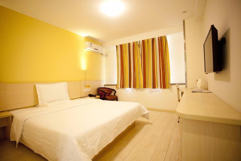 Тяньцзинь: 7Days Inn Tianjin five Avenue Tong Building