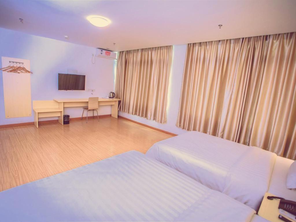 Маоминг: 7Days Inn Gaozhou Gaoliang West Road