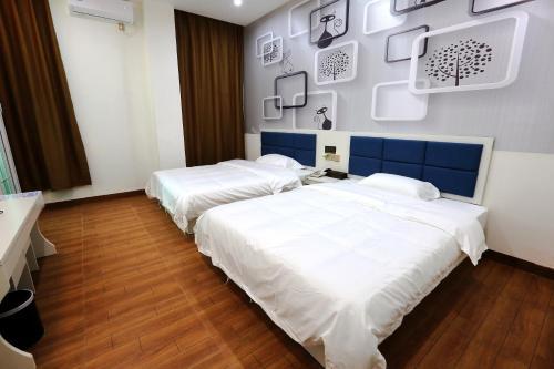Гуанчжоу: Hangcheng Wuyou Hotel New Baiyun Internationl Airport Branch