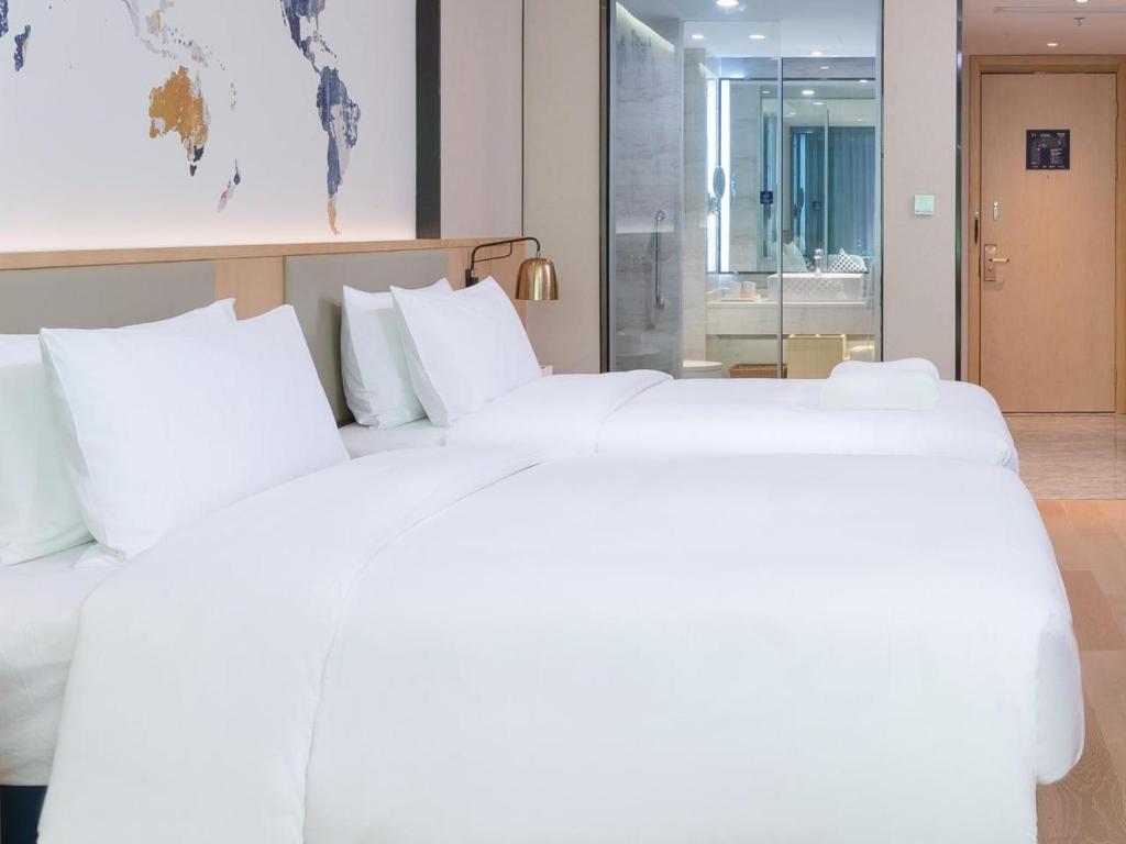 Шэньчжэнь: Shenzhen Universide-Senter＆BaoHe Road Kyriad Marvelous Hotel