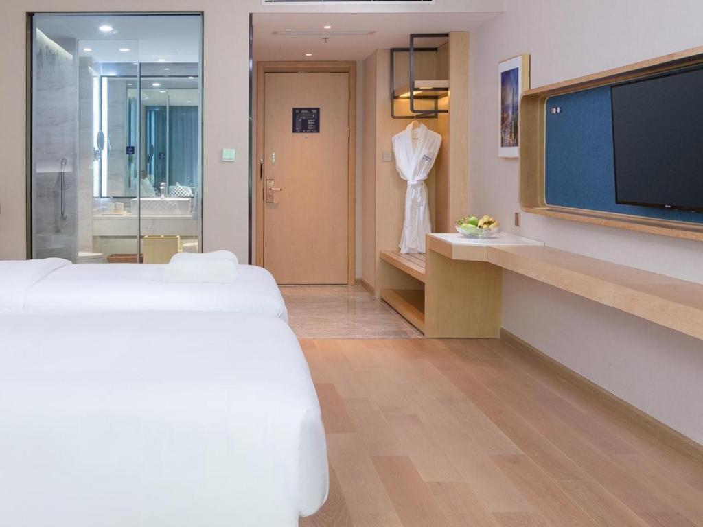 Шэньчжэнь: Shenzhen Universide-Senter＆BaoHe Road Kyriad Marvelous Hotel