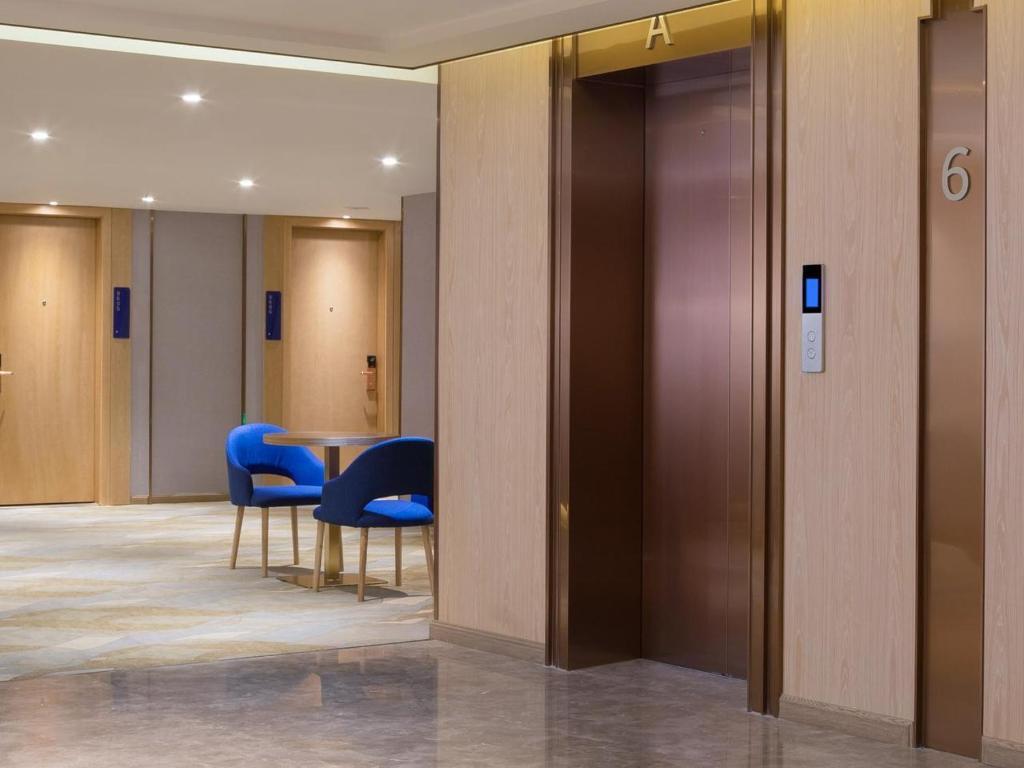 Шэньчжэнь: Shenzhen Universide-Senter＆BaoHe Road Kyriad Marvelous Hotel