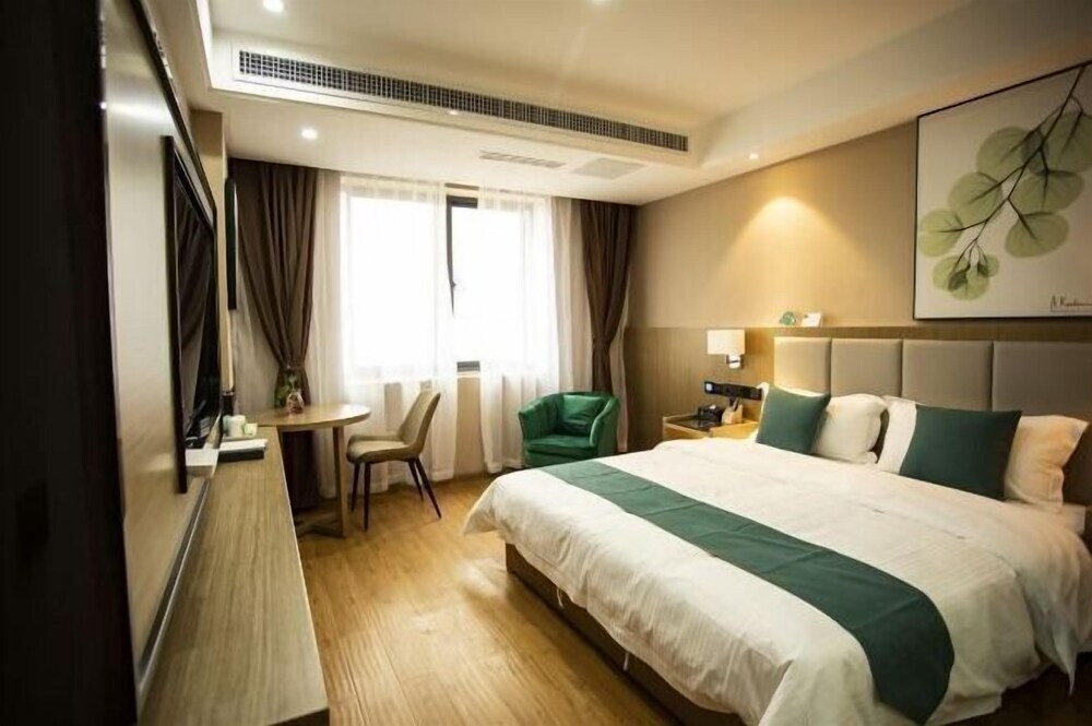 Дэхун: Greentree Inn Mang City Plaza Business Hotel