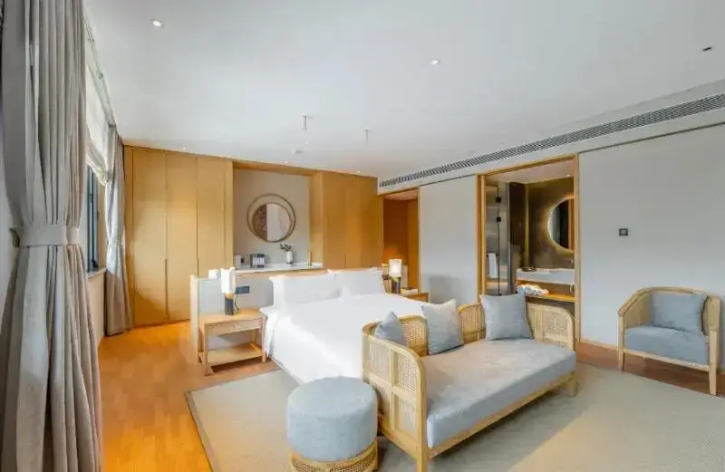 Циндао: Blossom Hill Hotel Qingdao Aduohuayu