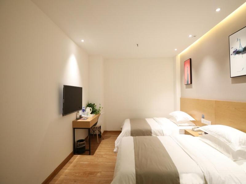 Чжэнчжоу: Shell Xinzheng Airport Port Huaxia Avenue Hotel