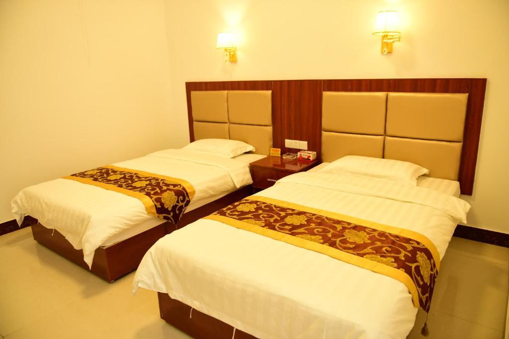 Цзюцюань: Dunhuang Happy Yijia Guest House
