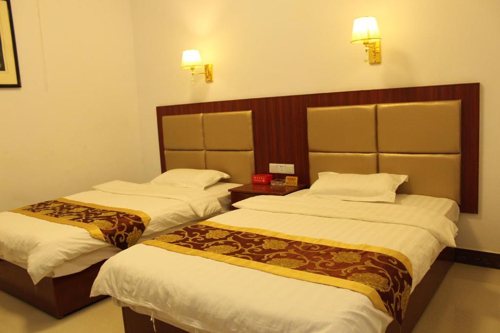 Цзюцюань: Dunhuang Happy Yijia Guest House
