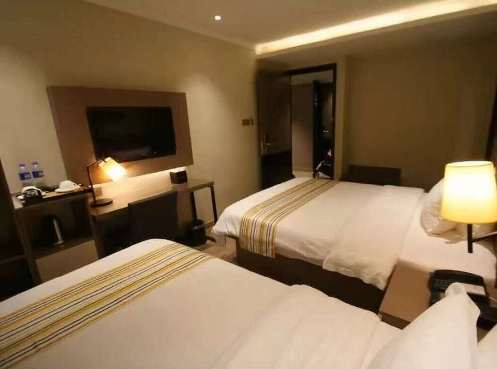 Шанхай: Home Inns Collection Hotel