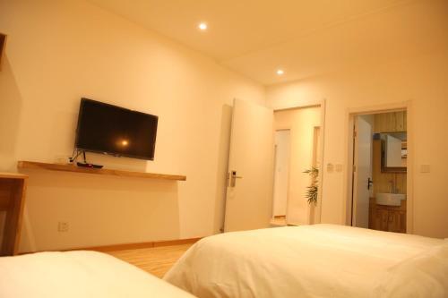 Циндао: Dengba Guest House Laoshan Branch